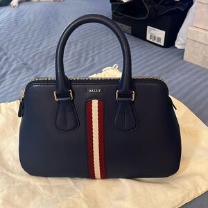 Bally Blue with Merlot and beige detail. Excellent condition with dust bag.